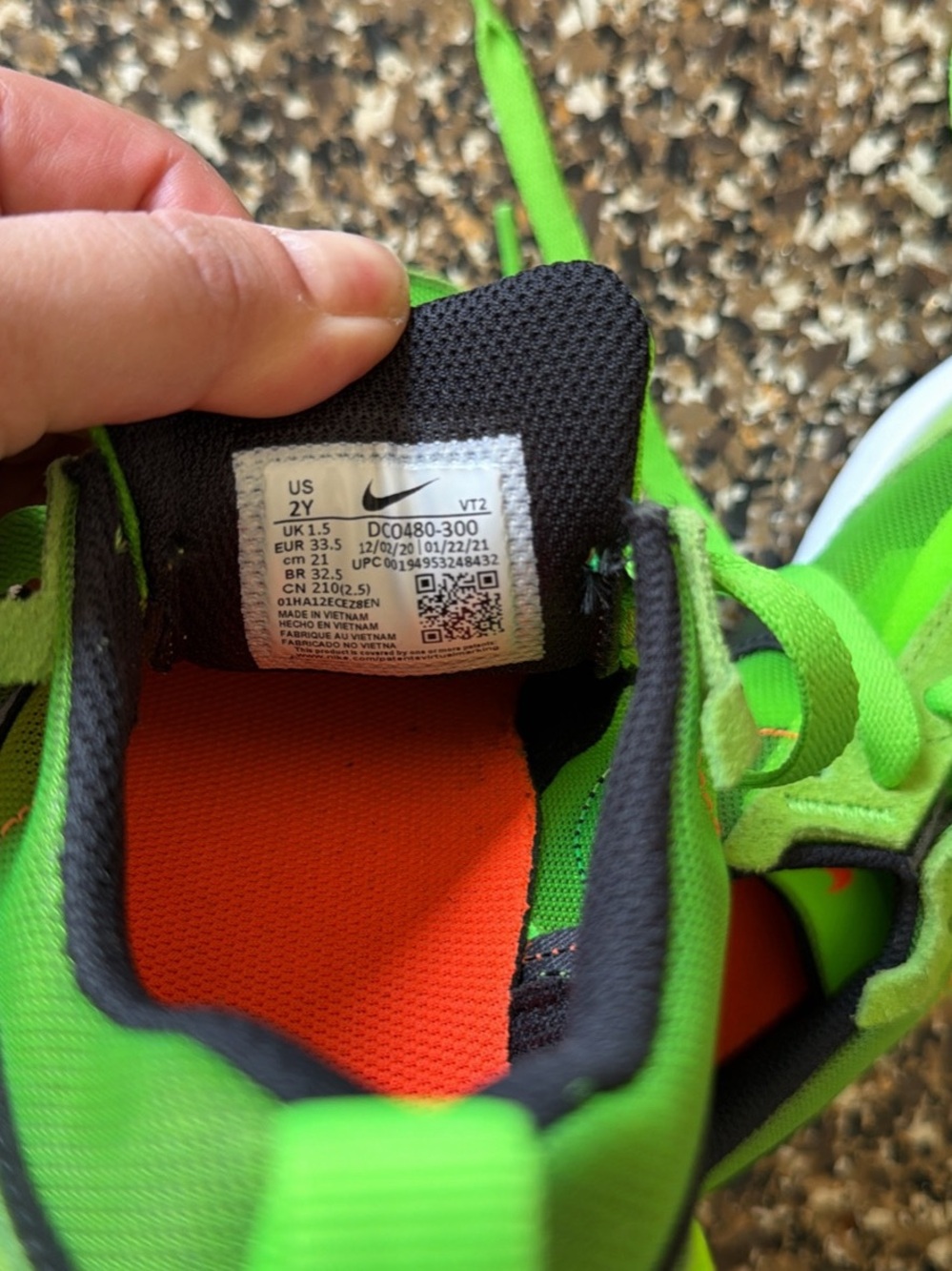 Nike Kids' Neon Green and Black Sneakers with Orange Insole
